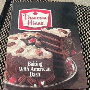 DUNCAN HINES “Baking with American Dash” cookbook.  Every baking recipe you want